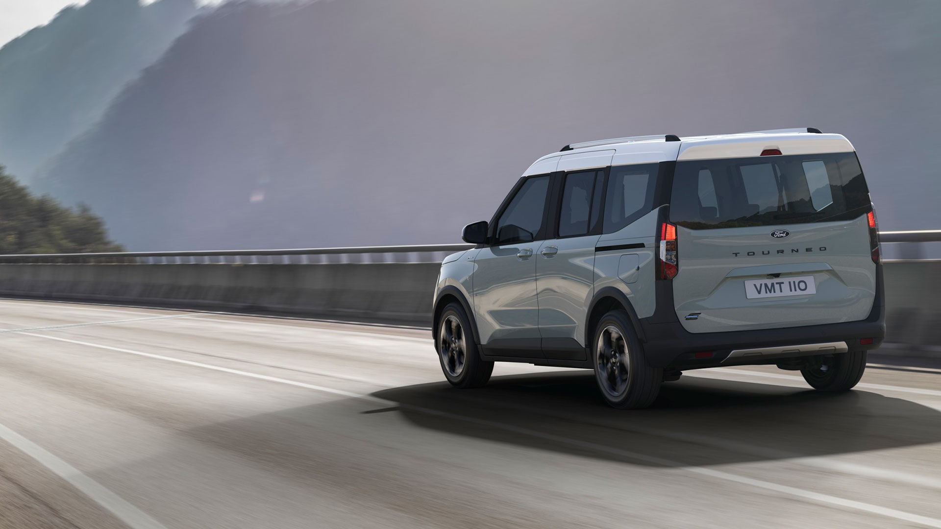 ford e_tourneo_courier eu Banner_E_Tourneo_Courier_Active_02 16x9 1920x1080 bb rear view v769 driving